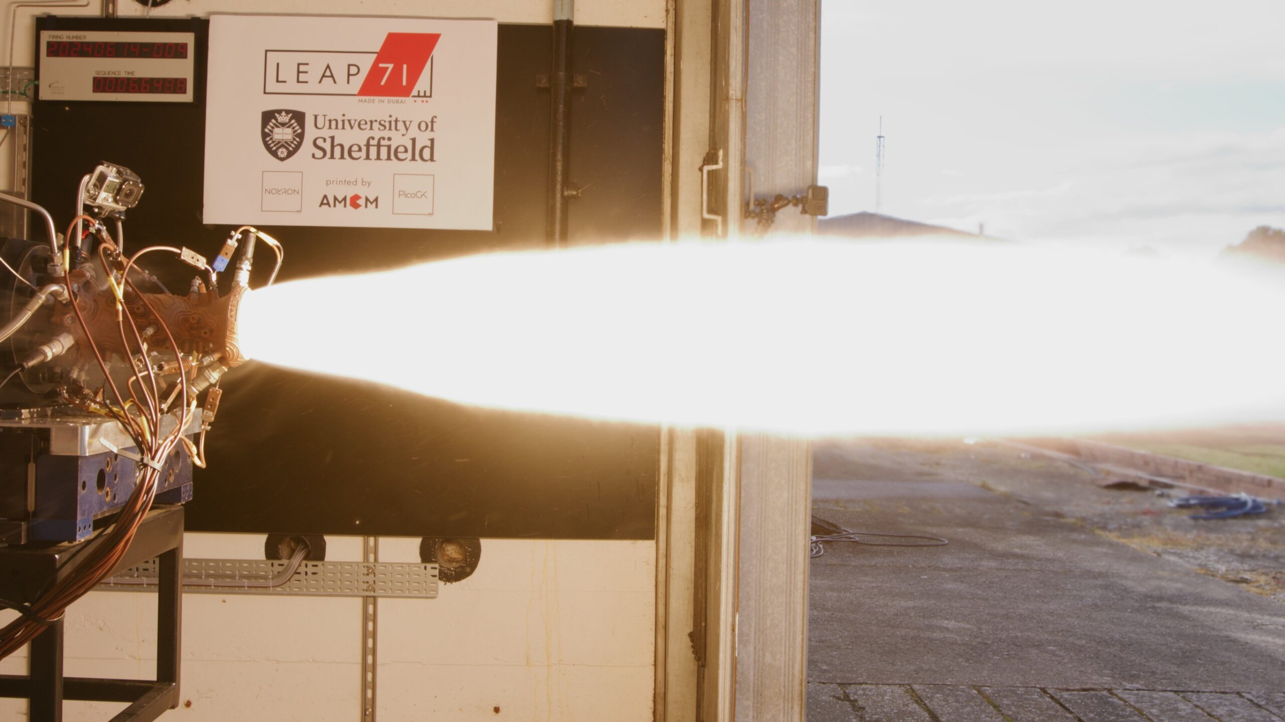 The blazing test site, symbolizing the collapse of the old order