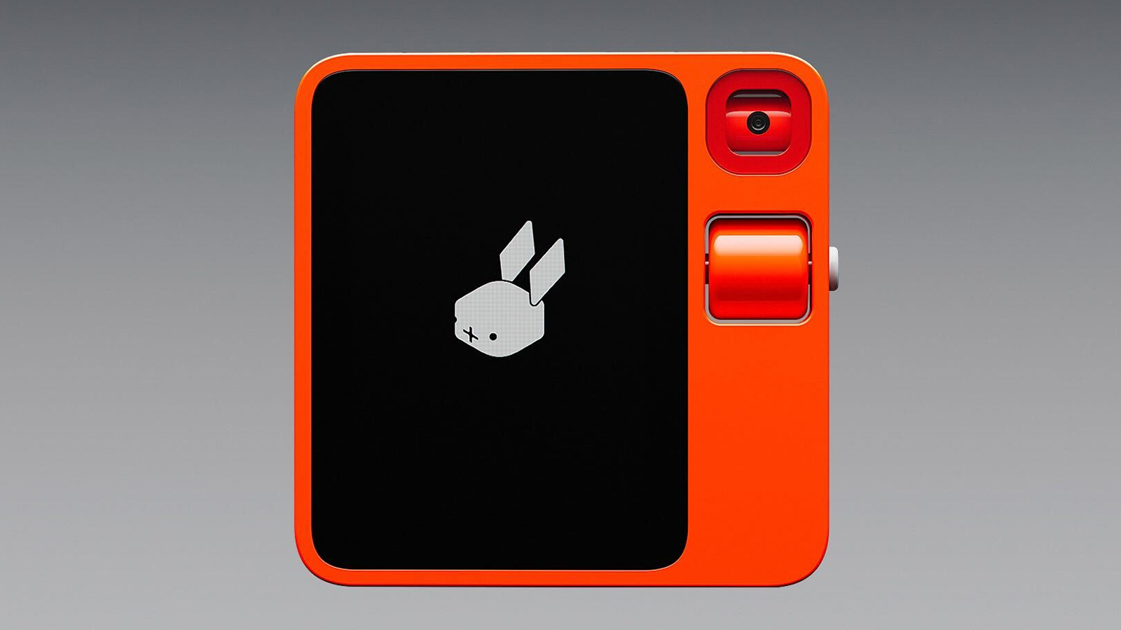 Rabbit R1 - A bright orange handheld device with a retro-futuristic design
